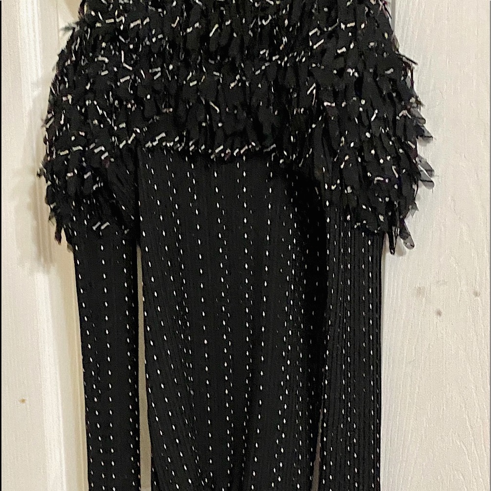 Black strap shirt with feather layers on top